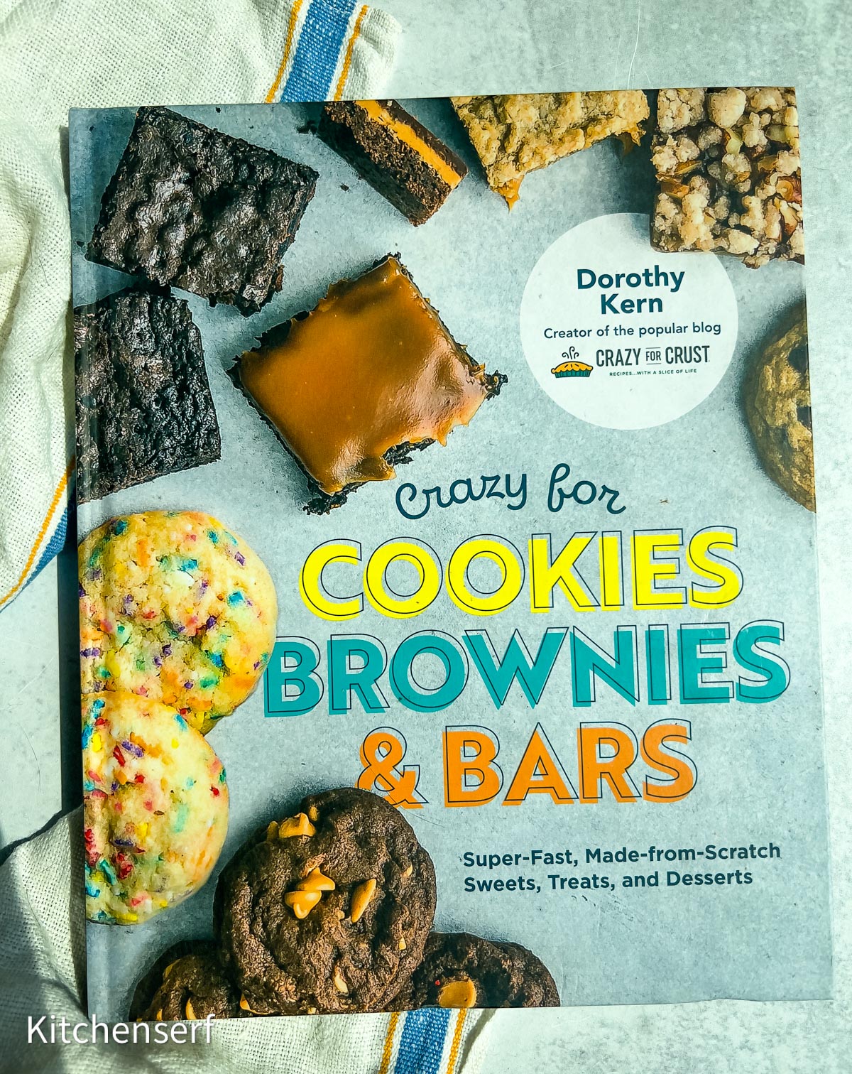 Cookbook titled Crazy for Cookies, Brownies & Bars, one of the must-have baking books, with assorted baked treats on the cover.