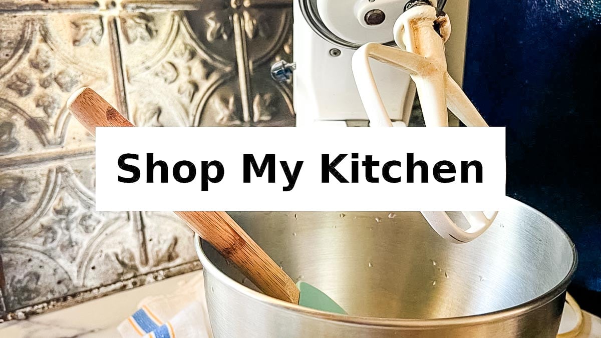A stand mixer with utensils and a sign that says Shop My Kitchen.